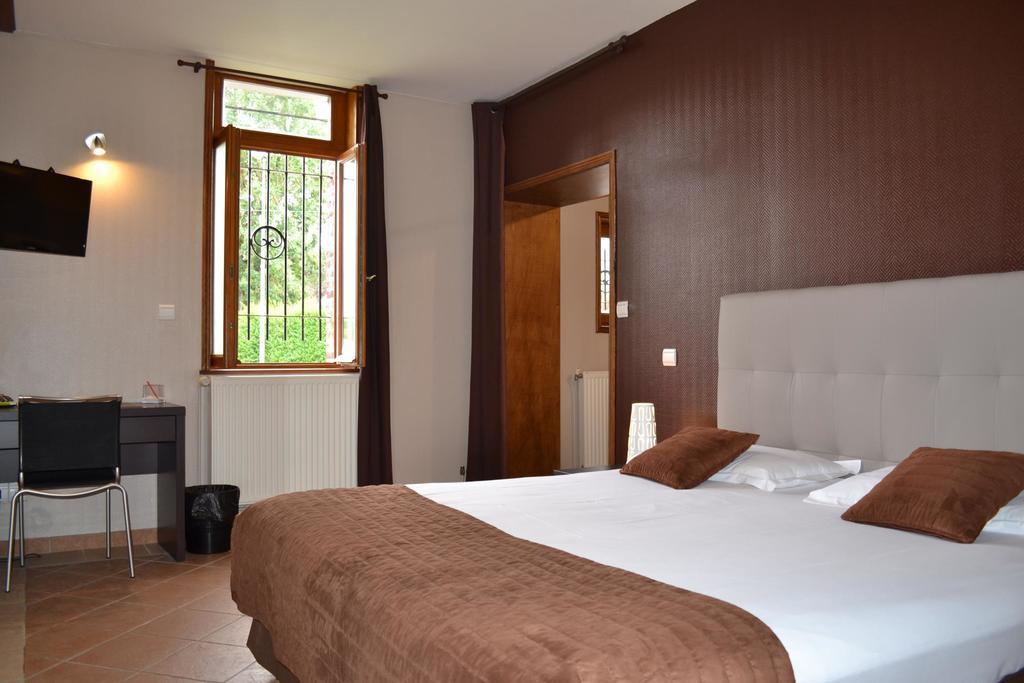Le Domaine Des Cigognes Hotell Ennevelin Rum bild